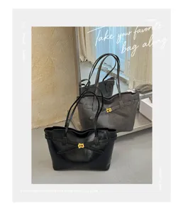Classic retro PU leather tote bag with stylish metal buckle for women daily commute.