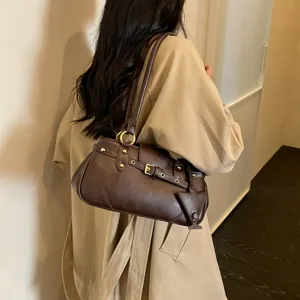 Trendy retro underarm shoulder bag for women, chic baguette bag with stylish metal hardware.
