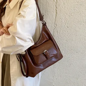 Retro braune Umhängetasche für Damen, große Kapazität, lässige Handtasche mit Fronttasche.