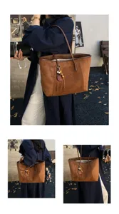 Retro bruine suèdetas voor dames, grote schoudertas voor herfst en winter dagelijks gebruik.
