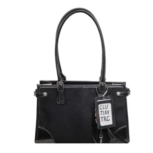 Black PU leather tote bag for women, stylish vintage shoulder bag with large capacity and tag.