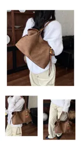 Detailed view of the brown suede tote bag showcasing soft texture and large capacity style.