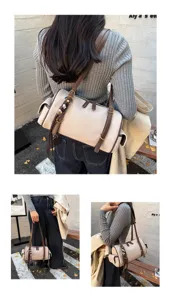 Detailansicht der Wildleder Boston Umhängetasche für Damen, große modische Freizeittasche.