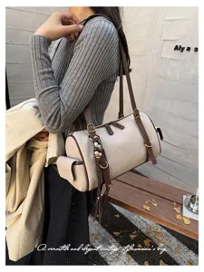 Wildleder Boston Schultertasche für Damen, große Zylinder Bowlingtasche mit stylischem Riemen.