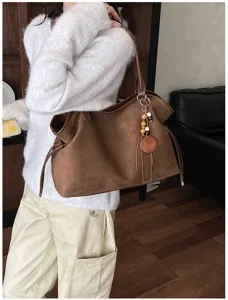 Casual retro suede tote bag with stylish pendant detail, perfect daily large shoulder bag for women.