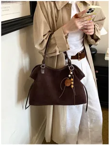 Retro brown suede tote bag for women, large capacity casual commuter shoulder bag with charm.