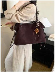 Retro brown suede tote bag for women, large capacity casual shoulder bag with tassel charm.