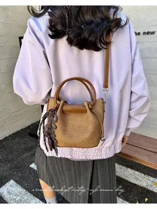 Vintage brown pleated women handbag casual stylish single shoulder crossbody bag detail view.