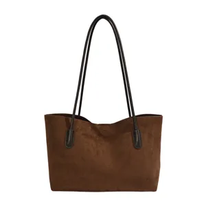 Brown suede commuter tote bag with double leather straps, stylish large capacity shoulder bag.