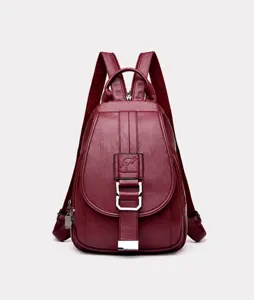 Red casual soft leather women's backpack with metal buckle, stylish daily travel bag.