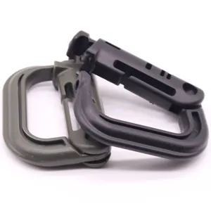 Close-up detail shot of durable plastic tactical carabiner D-ring clip for outdoor bags.