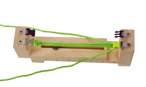 Wooden paracord jig bracelet making tool detail view, adjustable handmade knitting device.