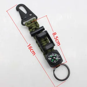 Multifunctional outdoor survival paracord keychain with compass and carabiner for camping hiking.