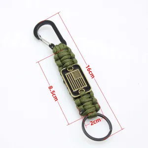 Green paracord keychain with carabiner and US flag badge, durable outdoor emergency gear 16cm