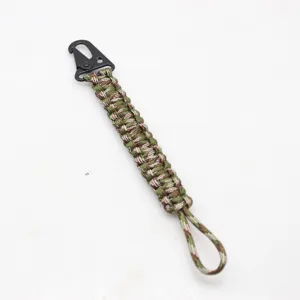 Detail view of durable 7-strand paracord keychain with black metal snap hook for outdoor use.