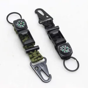 Multifunctional outdoor survival paracord keychain with compass and carabiner detail