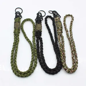 Outdoor paracord lanyard details, woven survival keychain and tactical phone strap hooks.
