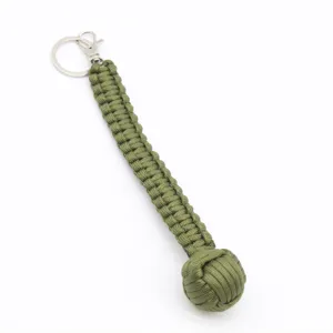 Llavero de puño de mono de paracord táctico para senderismo al aire libre y supervivencia.
