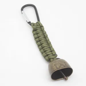 Detailed close-up view of the outdoor camping anti-bear bell paracord keychain attachment.