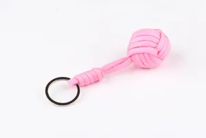 Pink paracord monkey fist keychain, handmade seven-core tactical EDC gear pendant.