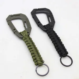 Outdoor paracord woven carabiner keychain versatile backpack strap multi-functional accessory.