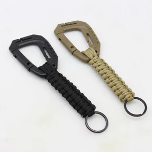 Outdoor paracord braided carabiner keychain 7-core survival rope backpack hanging pendant set.