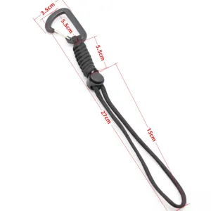 Outdoor tactical paracord keychain with carabiner and adjustable strap for camping and hiking.
