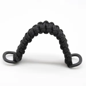 Black paracord braided handle detail with metal D-rings for bags and outdoor backpacks.