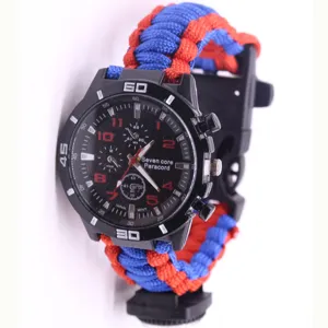 Outdoor survival paracord watch with blue and red braided strap and black multi-function dial.