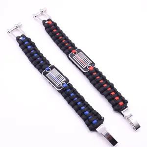 Paracord survival bracelets with metal U-shackle buckles and tactical flag dog tags.