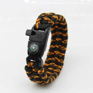 Outdoor survival paracord bracelet with compass and whistle, black orange 5-in-1 wrist rope.
