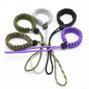 Paracord wrist strap for camera and outdoor survival, durable braided rope lanyard in multi colors.