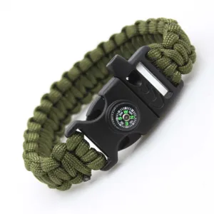 Detailed view of military green paracord survival bracelet with compass and buckle.