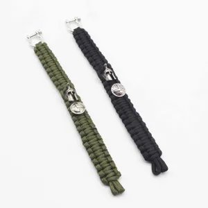 Paracord survival bracelet with Spartan helmet charm, outdoor tactical wristband gear.