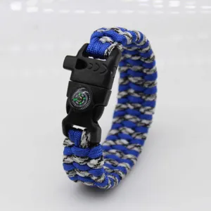 Outdoor survival paracord bracelet with compass and whistle, blue and white weave design.