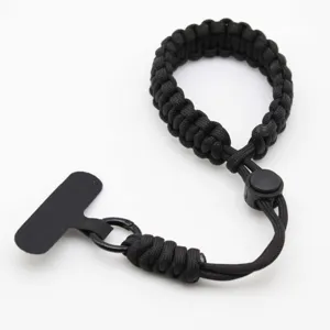 Duurzame zwarte paracord polsband voor telefoon met verstelbare gesp voor veilig gebruik.