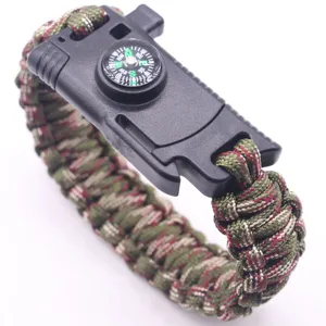 Outdoor survival paracord bracelet with compass buckle for camping and hiking adventures.