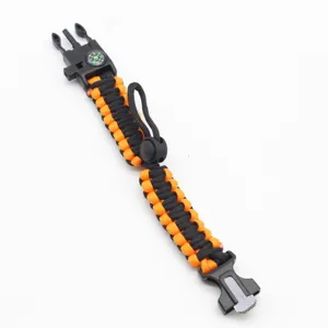 Multi-functional outdoor survival paracord bracelet with compass and whistle for camping.