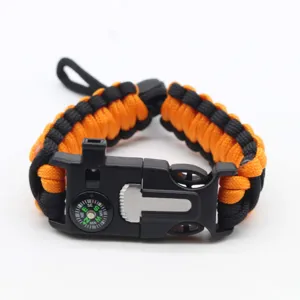 Survival paracord bracelet with compass and multi-functional buckle for outdoor camping.