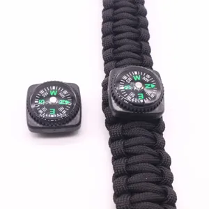 Mini boussole de survie avec bracelet paracorde noir, accessoire camping etanche.