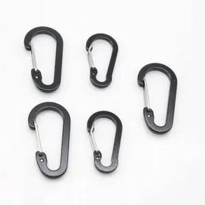 Close-up view of black aluminum wire gate carabiners showing detailed spring snap hooks.