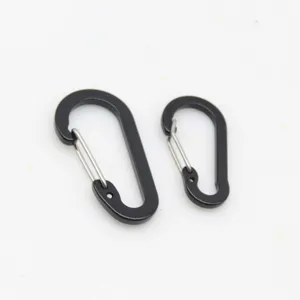 Close-up detail of black aluminum wire gate carabiner spring snap hook hardware accessories.