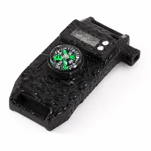 Multifunctional outdoor survival compass whistle buckle with waterproof design for camping gear.