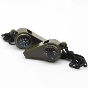 Sifflet de survie 3 en 1 vert avec boussole intégrée, thermomètre et cordon noir pratique.