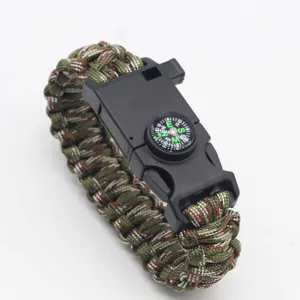 Survival paracord bracelet with compass and buckle for outdoor camping and hiking.