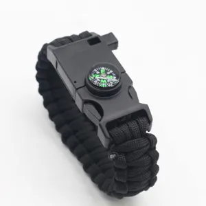 Black paracord survival bracelet with compass, multi-functional outdoor tactical gear.