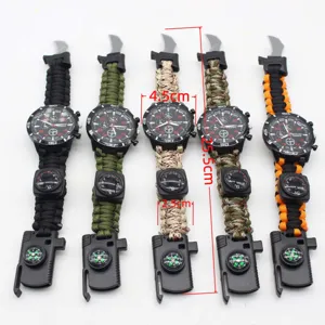 Paracord survival watch with quartz movement and multi-functional outdoor rescue tools.
