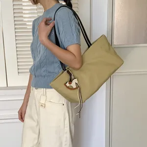 Canvas tote shoulder bag for women large capacity daily commuter handbag with rocking horse charm