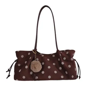 Retro polka dot shoulder tote bag with cute plush ball pendant, casual autumn winter handbag.