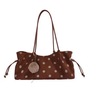 Retro polka dot tote bag for women, stylish casual shoulder bag with cute fluffy pom charm.